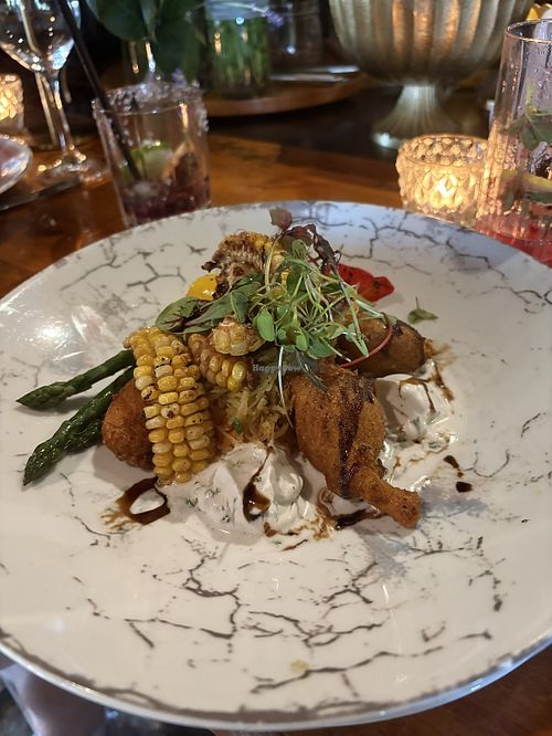 Vegan squash and sweet potato entrée with corn ribs and vegan tzatziki  at Crossroads Restaurant in Parry Sound District