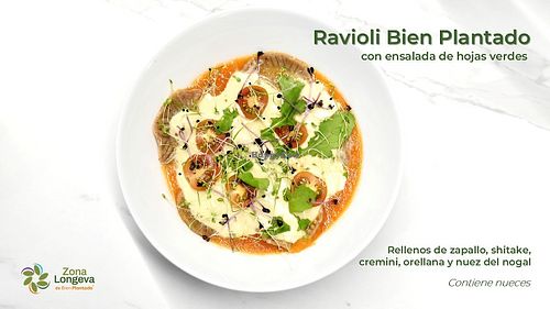 Home made ravioli with filling of shitake, cremini and oyster mushrooms, with butternut squash and walnuts, served with napolitan and cashews sauce. at Bien Plantado - Vegan Food (Temporary Closed) in Loreto
