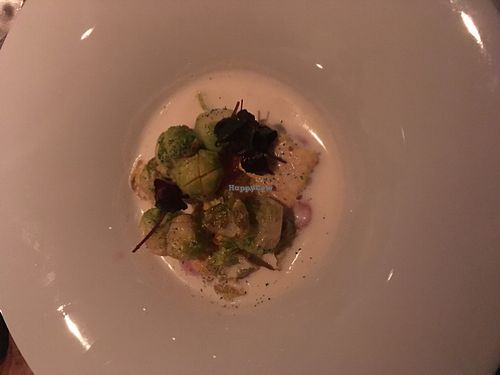Brussels sprouts, corn and grapefruit in cream at TIAN Munich in Munich