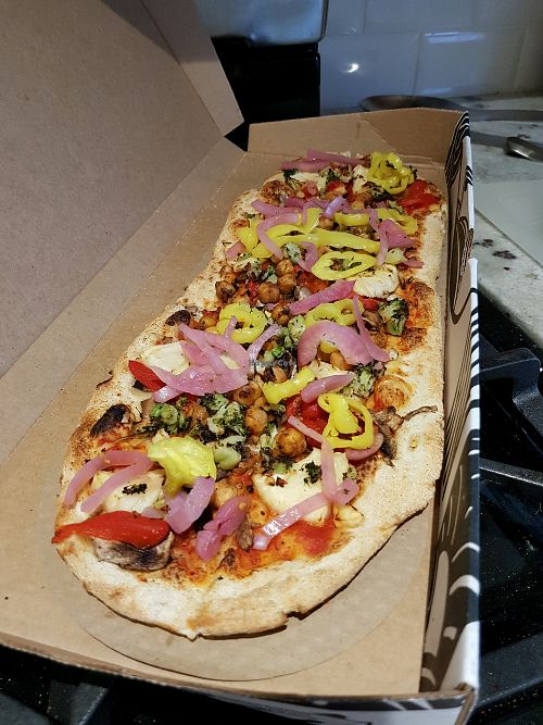 pretty much all the veg toppings but no cheese at &pizza in Bethesda