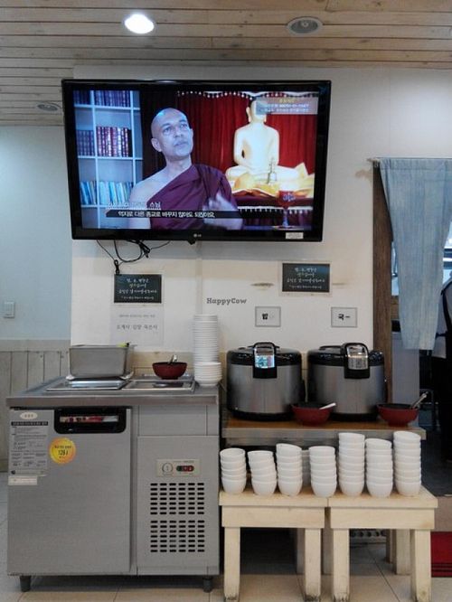Kimchi, rice and soup available at this counter. Self-serve. at Jogyesa Kitchen - 조계사 승소 in Seoul
