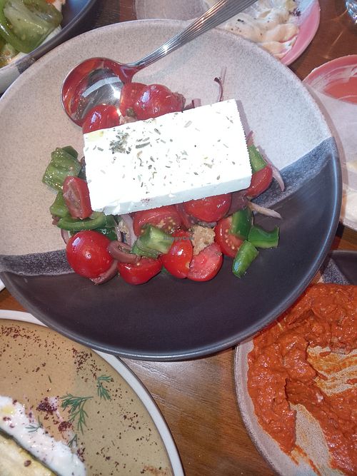 Tomato salad with feta at Kitty Hawk Rooftop Bar and Restaurant in London