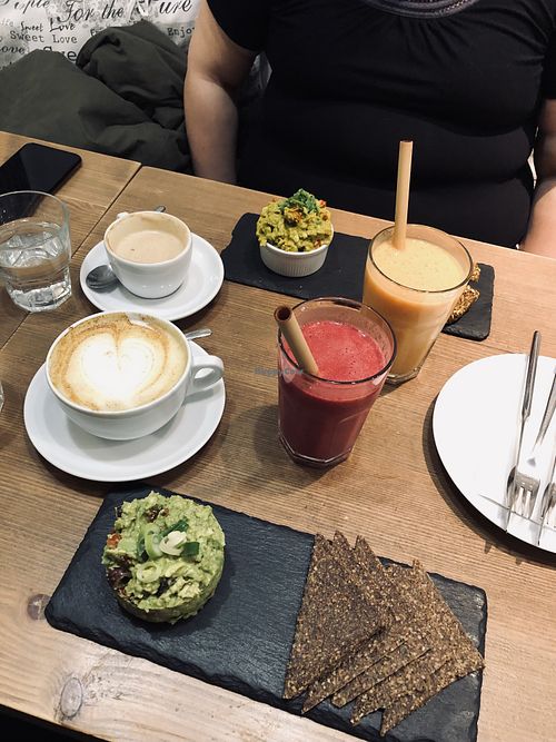 Avocado Tartar, Avocado ‚scrumbled eggs‘, smoothies and pumpkin spice latte 👌🏻 at MyRaw Cafe in Prague