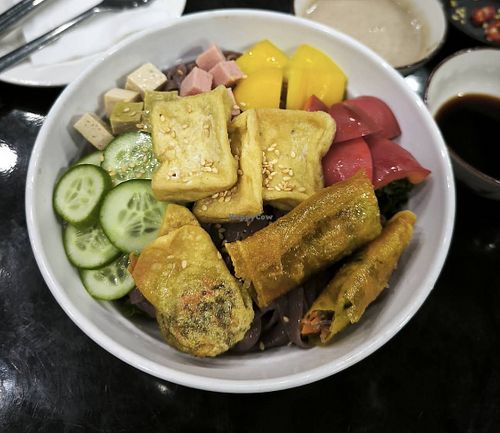 Signature dish: mixed brown rice bowl   at Bếp nhà Anna in Da Nang