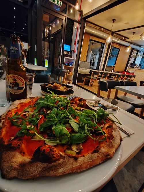 Vegetable pizza and roasted potato at COTTO in Leeds
