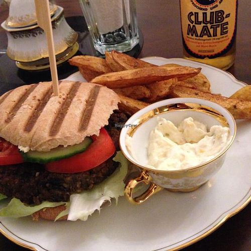 This is their 'Roots of Compassion burger' with home made bread bun, burger patty, BBQ sauce and mango mayonnaise. Everything's self made and delicious.  at Kruemelkueche in Duisburg