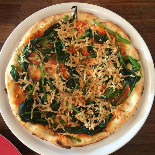 Pizza with spinach and tofu at Brunetti's Veganarium in Berlin