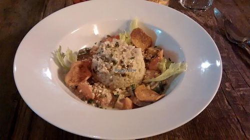Creamy risotto with fried vegetables at Brasserie LoLa in Paris