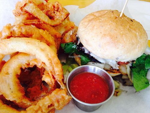 Portobello mushroom burger and onion rings at Go Vegan Grill in Decatur