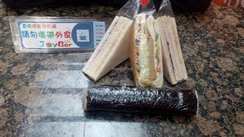 sandwiches and sushi roll at Joy Bar in Taipei
