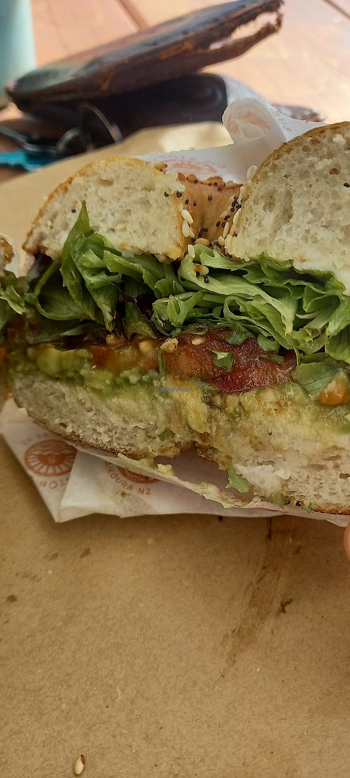 Tomato avo seeded bagel with vegan cream cheese at Bus Stop Cafe Kaikoura in Kaikoura