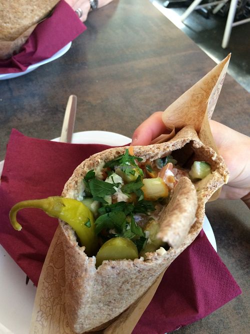 'Half and half' pita, half houmous, and half falafel, with a generous portion of fresh and pickled salads. at Humpit in Leeds
