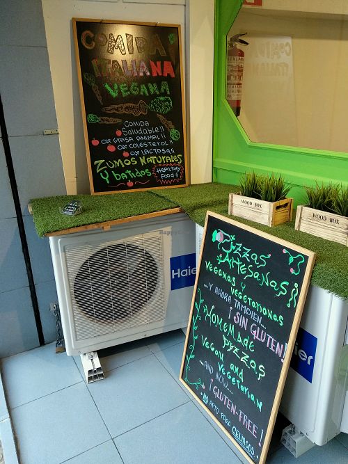Menu Boards Outside at Dolce Pizza y Los Veganos - Hipolit Lazaro in Barcelona