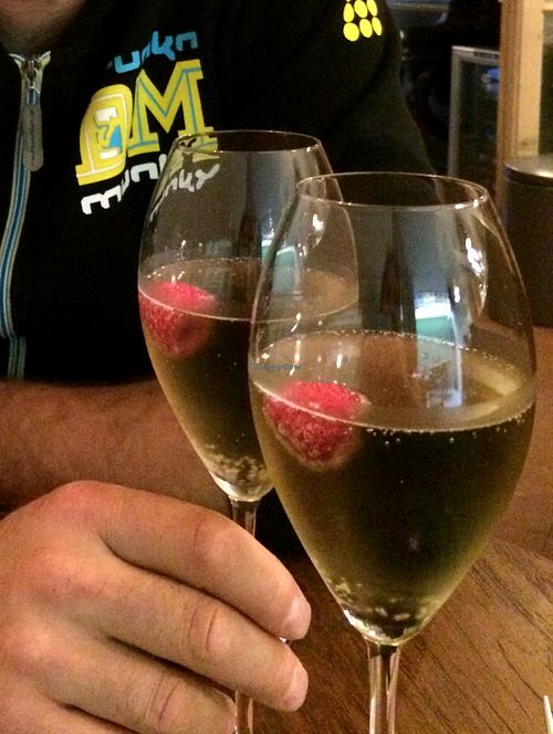 Lavender-infused sparkling wine with a raspberry at Bites and Wines in Antwerpen