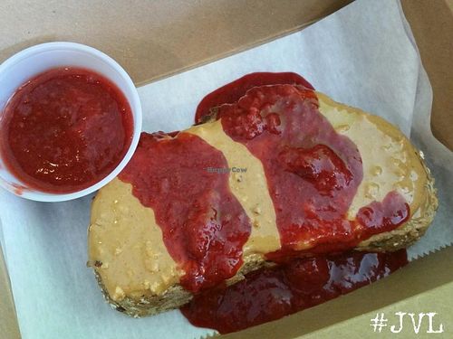 Smothered Toast...whole wheat with peanut butter and stawberry fruit compote ($2.50)  at Garden Truck in Jacksonville