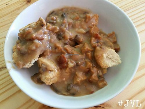 'Sausage and Biscuits' with shallot mushroom gravy ($4.95) made with their housemade fennel seitan sausage  at Garden Truck in Jacksonville