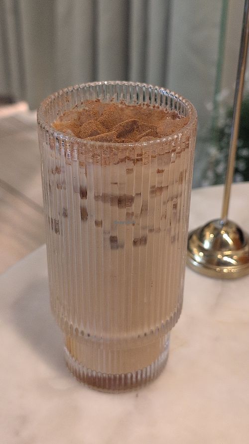 Chai latte with oat milk at Le Petit Paris Cafe Southside in Jacksonville