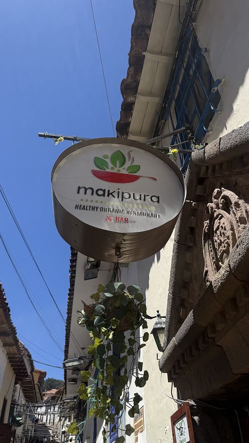 front sign  at Makipura Organic Restaurant in Cusco
