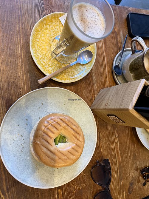 Bagel with avo and oat milk latte  at Balta Brunch - Porto in Porto