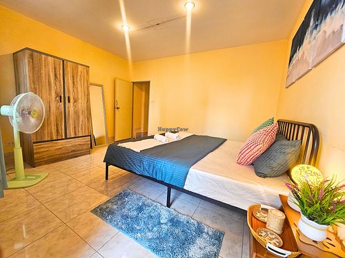 Deluxe Double Room with Balcony that has a king bed at Ubuntu Live Boutique Hostel & Rooms in Phuket