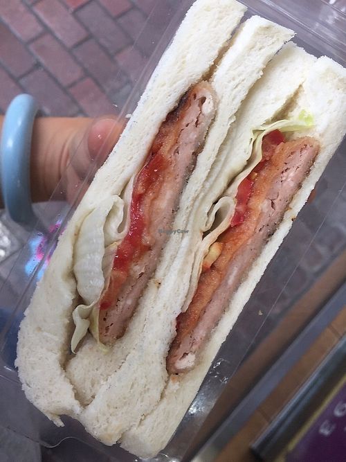 Sandwiches with tomatoes and mock pork chop at Affinity Vegetarian in Kowloon