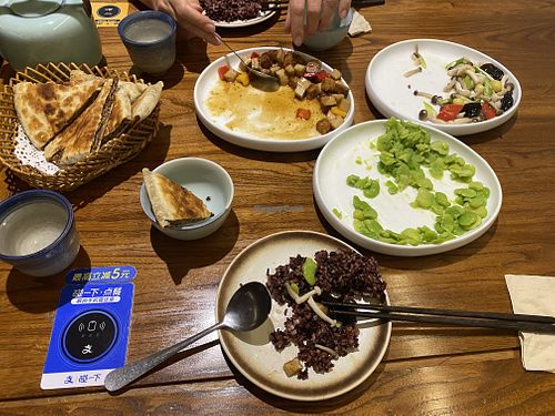 Sautéed broad beans, mushrooms, seitan, and sesame cakes. All delicious!  at Ye Bozhai Imperial Vegetarian Restaurant in 