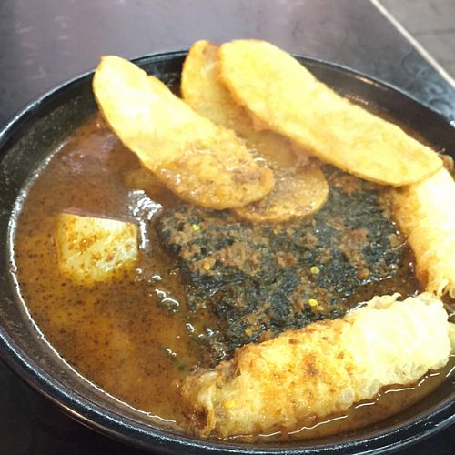 Laksa noodles soup (toppings: potato fries, seaweed, deep fried bean curd rolls and radish) at So Yuet Hin 素悅軒 in New Territories