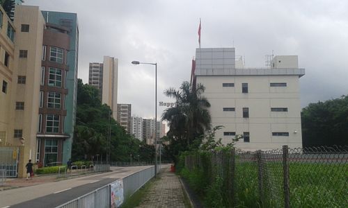 This view is visible after coming through a few trees after taking the 2nd exit from the footpath. The building on the right in with a flag on top is the fire station. Opposite the front of the fires station is Tuen On Lane. at Ching Leung Fat Yuen Ching Yan Siu Chok in New Territories