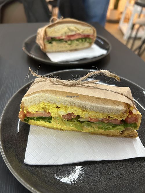 Egg sandwich and hummus sandwich (background)  at U Café  in Prague