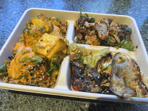 Make your own tray, farmers grains. Lime leaf tofu, roasted cauliflower and roasted chilli aubergine   at Farmer J Strand in London