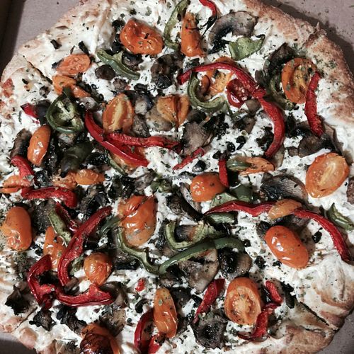 Daiya, garlic white sauce, mushrooms, tomatoes, and bell peppers.  at SOL Pie Pizza in North Canton