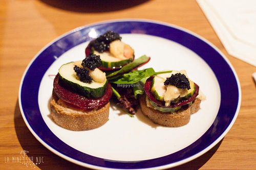 AMAZING vegan starter bites: toast + vegan spread, cashew truffle cream, beetroot, cucumber & seaweed 'caviar'. at Flax & Kale - Placa Castella in Barcelona