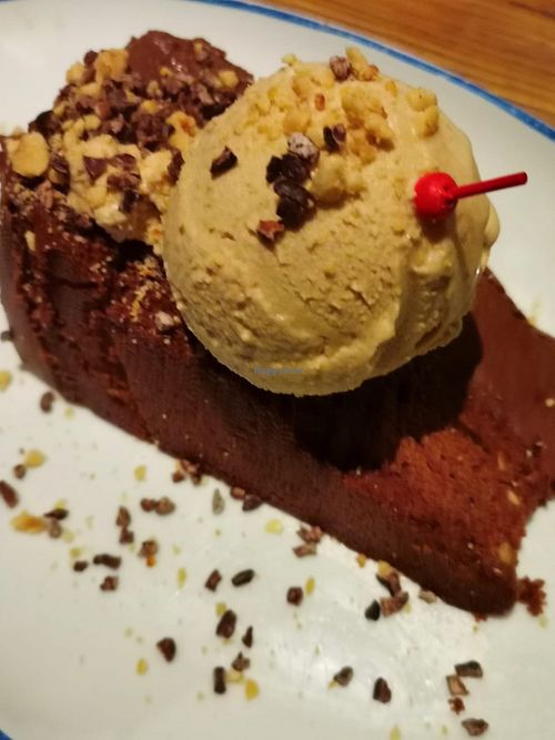 Three chocolate cake with hazelnut ice-cream  at Flax & Kale - Placa Castella in Barcelona