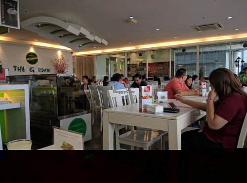 Inside the restaurant. Pretty big shop, a lot of tables at The Garden Restaurant - Krystal Point in Penang