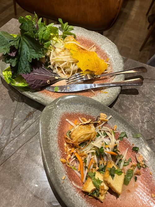 Vegan pancake and papaya salad  at Madame Vy in Surbiton