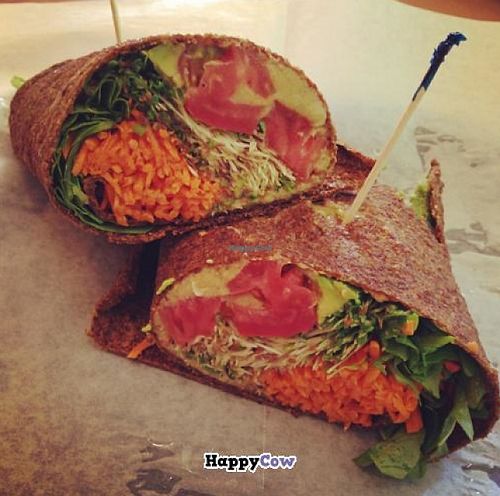 Rainbow	Wrap: avocado, sprouts, arugula, tomato,	shredded carrots, hummus & balsamic vinaigrette all in a raw wrap! YUM at Zia's Cafe in Towson