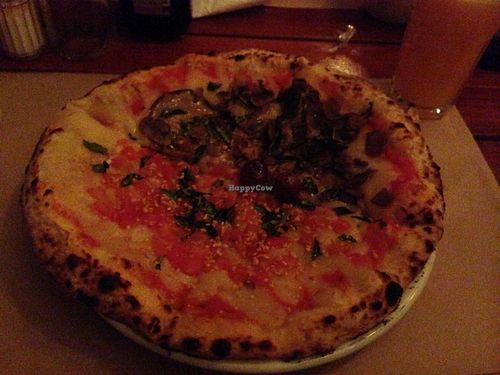 Individual pizza with two flavours. at A Pizza da Mooca in Sao Paulo