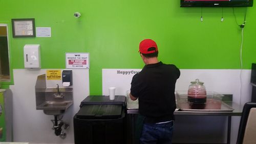 getting the juice at Dr. Jolly Sugarcane Juice in Rosemead