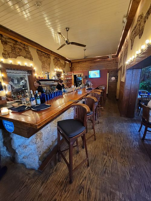 Seating at the bar without a reservation at Yemanja Woodfired Grill in Oranjestad