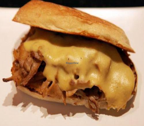 Philly cheesesteak: thinly-sliced seitan, peppers, mushrooms, and onions then smothered melted. at M Cafe in Los Angeles