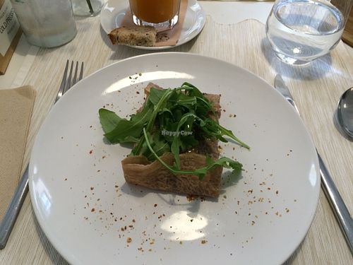 Galette bretonne (savory buckwheat crêpe) with sweet onion, arugula, walnuts and vegan cheese at El Vergel Veggie Restaurant in Tarragona