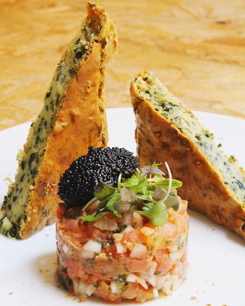 Seaweeds cake with tomato tartar and vegan caviar at El Vergel Veggie Restaurant in Tarragona