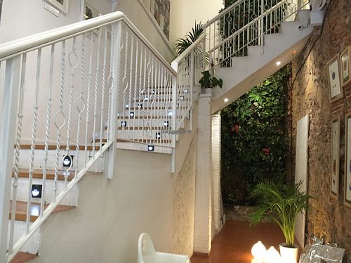 stairs up to the restaurant  at El Vergel Veggie Restaurant in Tarragona