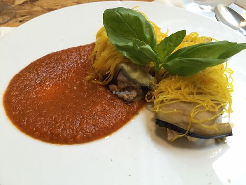 pasta capeli wrapped around aubergine stuffed with tomato, basil and vegan Parmesan  at El Vergel Veggie Restaurant in Tarragona