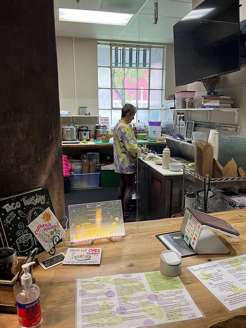 Preparing orders at Raw Fresno in Fresno