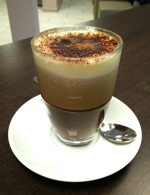 Organic and fair trade produced cacao made to hot Chocolate with a creamy soy milk at Venjoy in Cologne