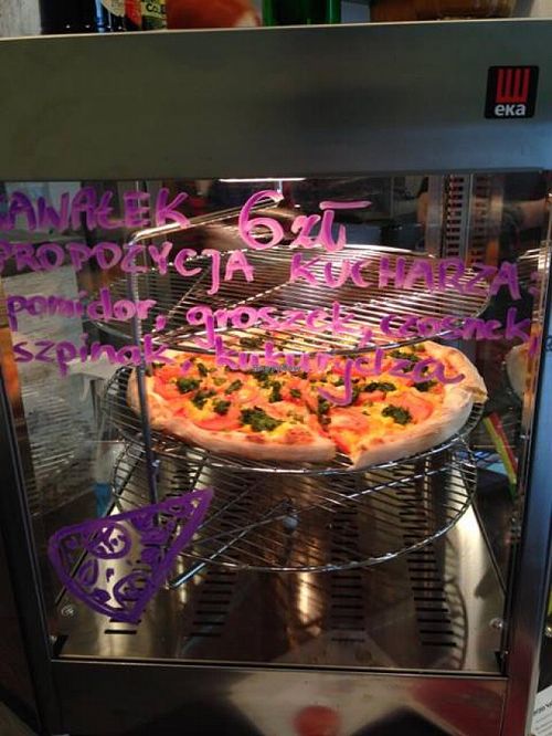 Pizza by slice at Vegan Pizza in Warsaw