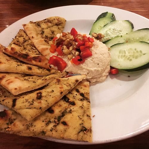 Zaa'tar flatbread, hummus and cucumber slices at Veggie Grill by Next Level in Pasadena