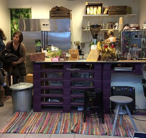 Seating for about 10 people around the edges of the room, with this counter/prep area at the back of the room. Lots of people picked up takeaway orders. at Lotta Love in Malmo