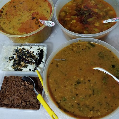 Various curry gravy  - takeaway at Ananda Bhavan - Syed Alwi Rd in Central Singapore